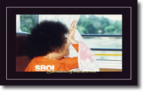 Sri-Sathya-Sai-Baba-looking-out-of-a-bus-window - wallpaper large size 1600x 1200
