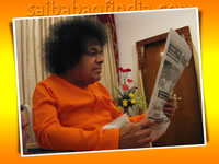 sri-sathya-sai-baba-high-resolution-picture-reading-newspaper