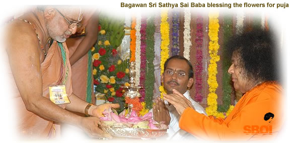 June2008 - sai_baba_blessing_the flowers_for_puja